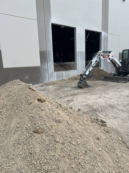 Breaking out and hauling off concrete at a Salt Lake area job site