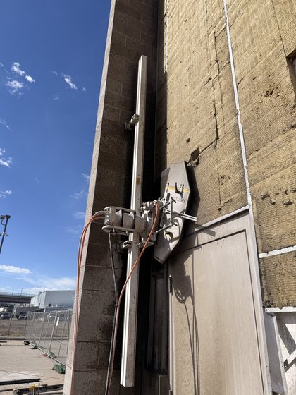 A track mounted wall saw cutting a clean vertical opening in a concrete wall in the Salt Lake area